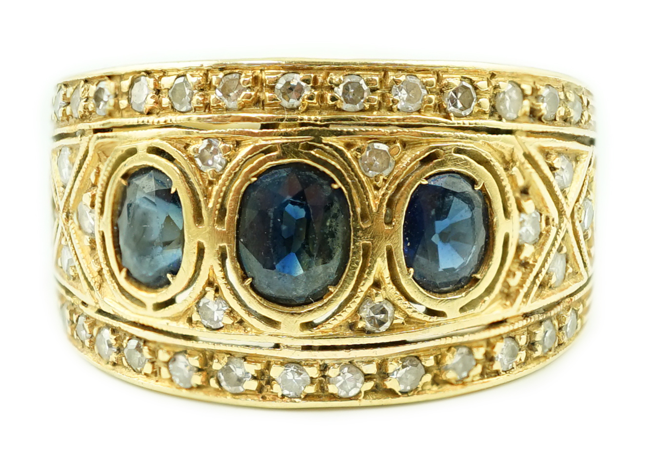 An Italian Byzantine style 18k gold, sapphire and diamond cluster ring
